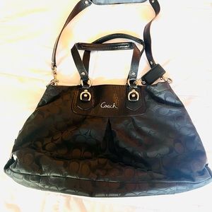 Coach purse. Black . Not leather. Like new!